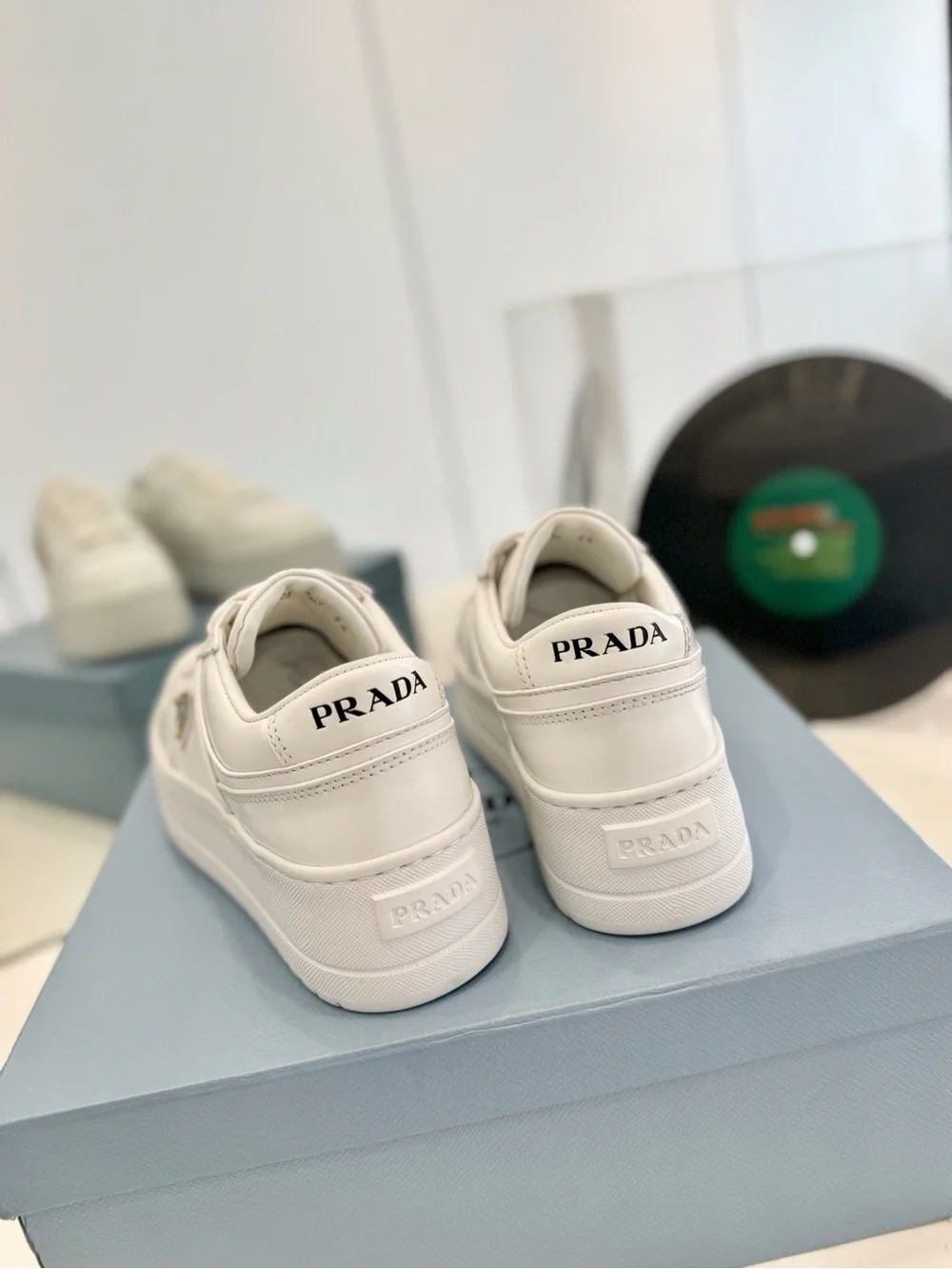 White Leather Platform Lace-Up Sneakers with Gold Triangle Accent